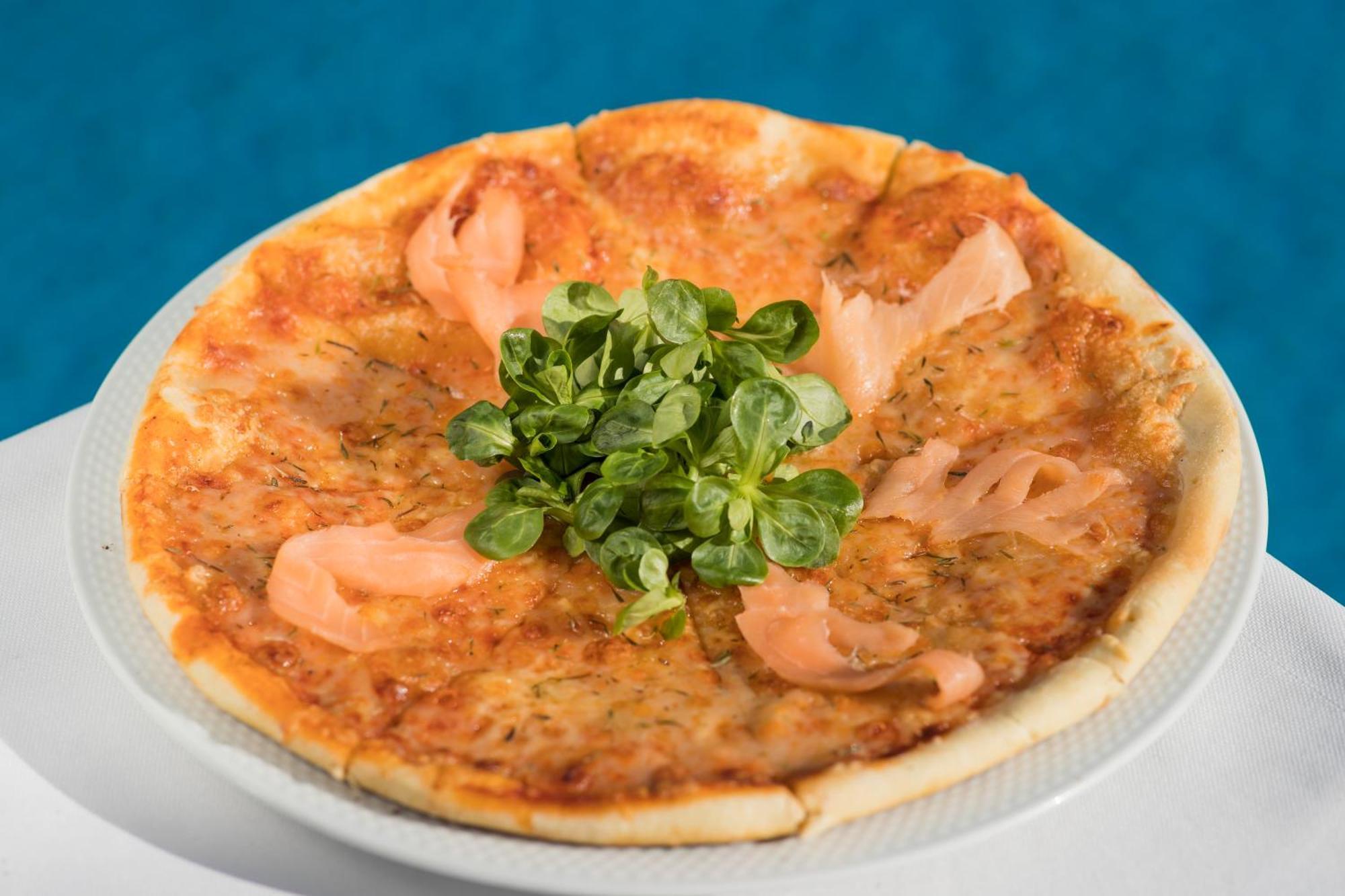 Grand Mogador Agdal & Spa Marrakesh Exterior photo A salmon pizza