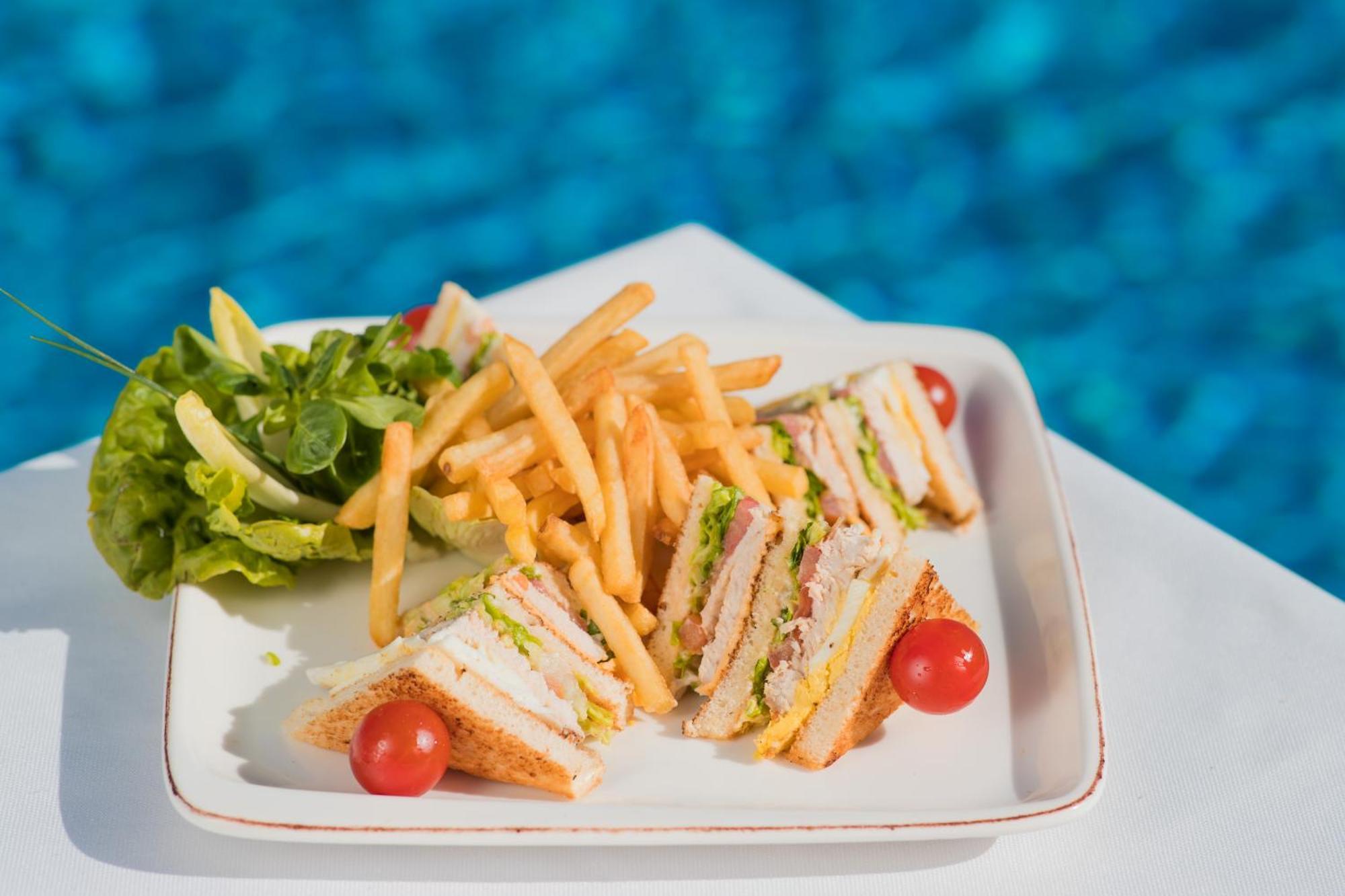 Grand Mogador Agdal & Spa Marrakesh Exterior photo A club sandwich with chips and salad